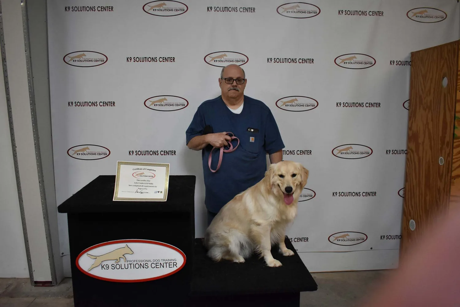 Handler and dog at K9 Solutions Center